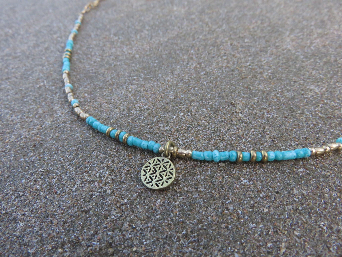 Anklet with the motif of the flower of life made of brass 