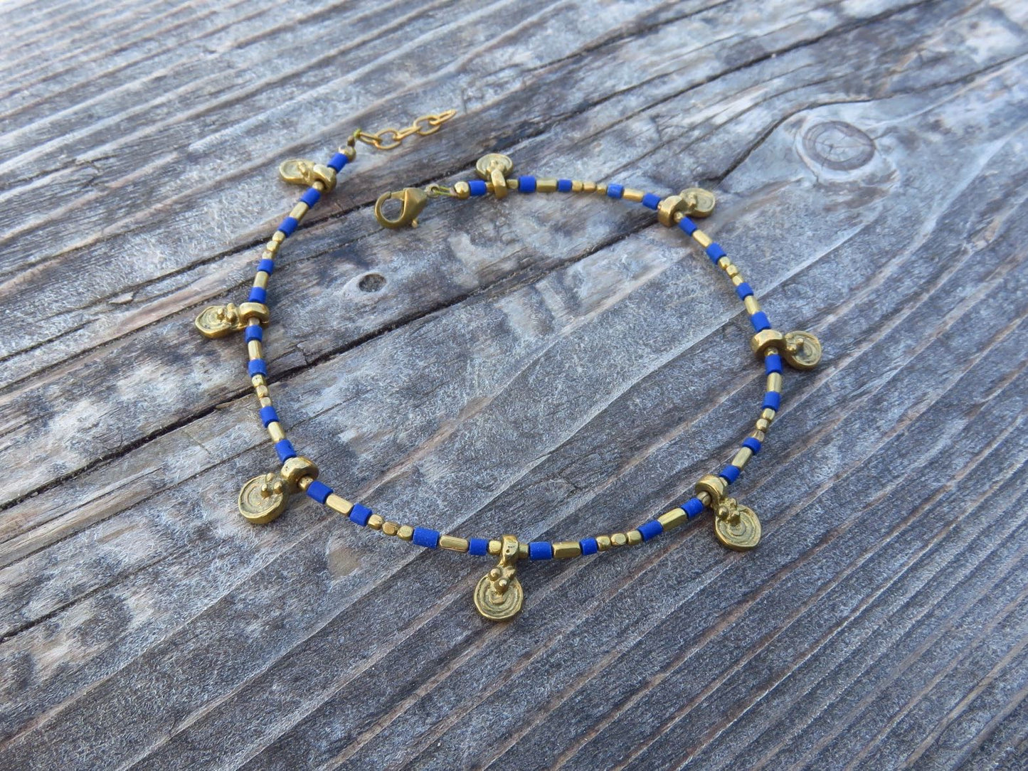 Anklet with small spirals and blue beads 