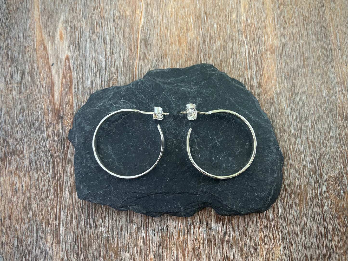 large, simple hoop earrings with hammered silver 