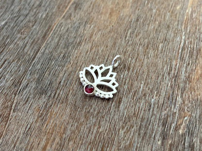 Lotus flower pendant with garnet stone and silver dots 