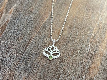 Lotus flower pendant with peridot stone and silver dots 