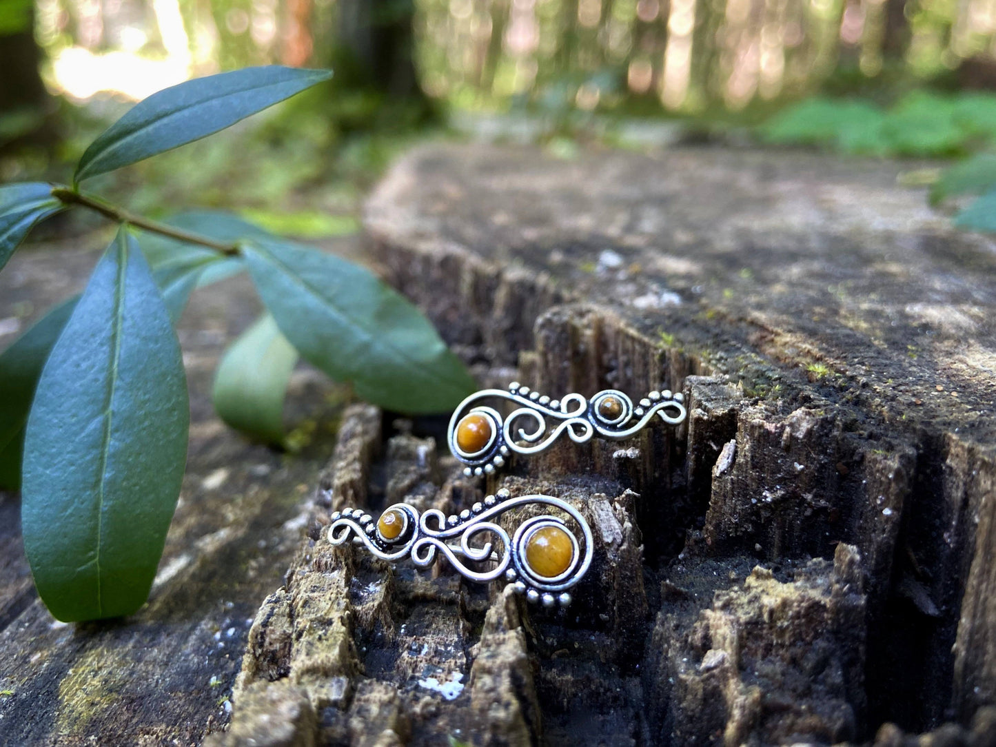 Earclimber earrings with tiger eye stones made of silver 