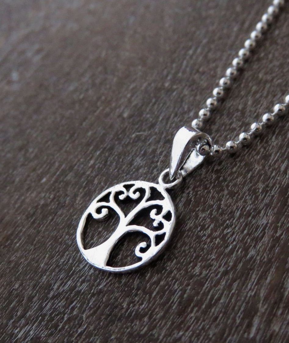 Pendant with the motif of the tree of life made of silver