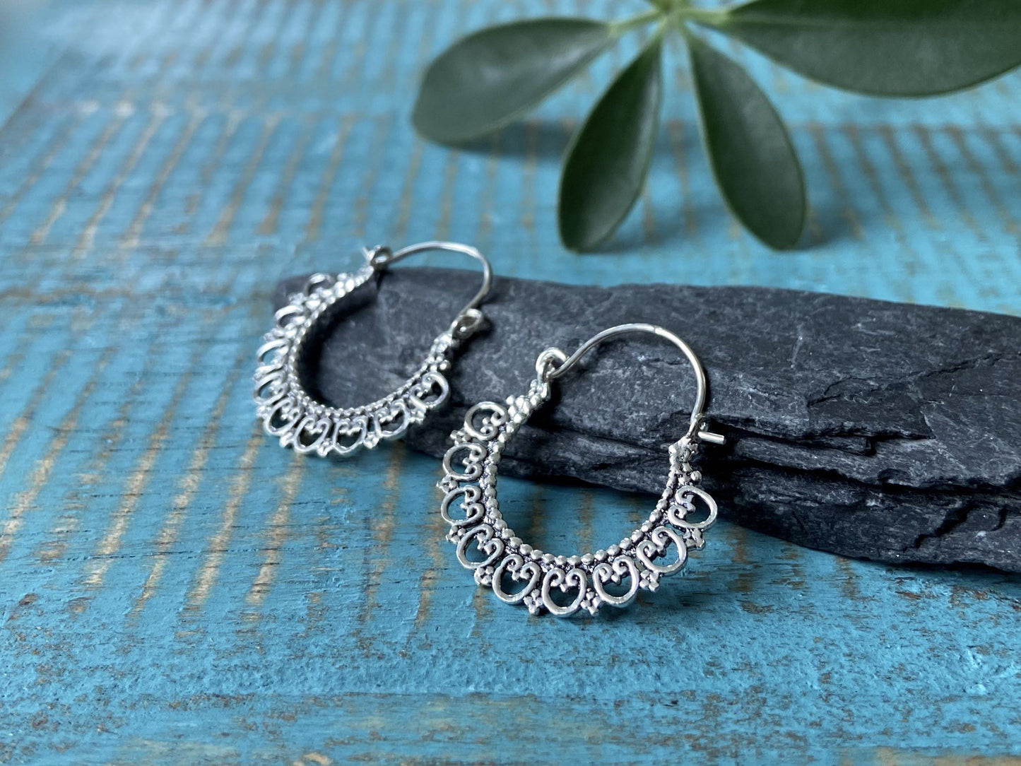 patterned hoop earrings small spirals made of silver