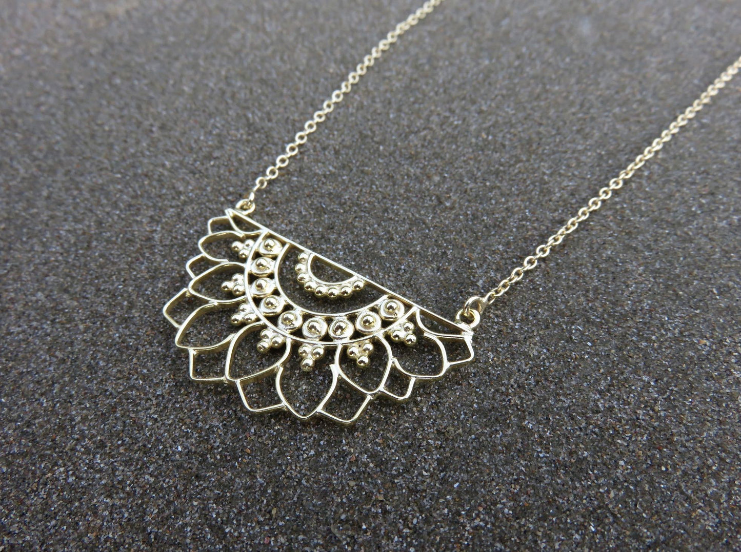 Mandala necklace with floral pattern made of brass 