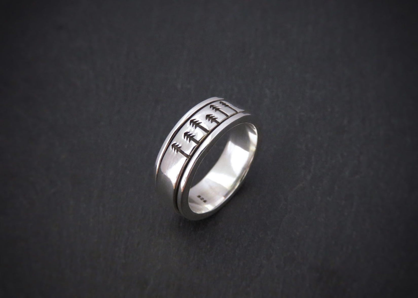 Rotating men's ring made of silver with trees