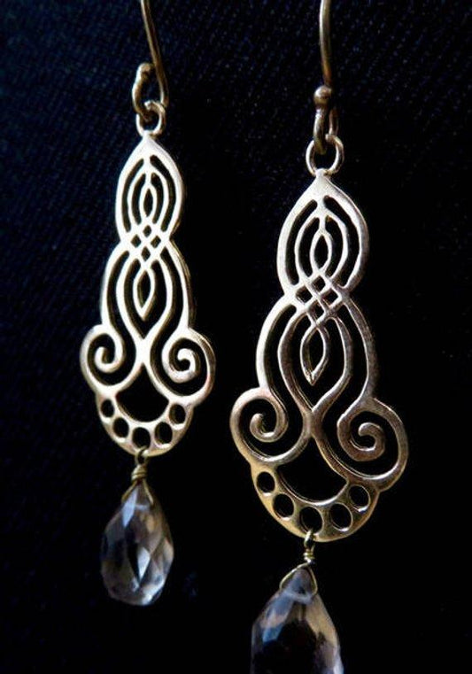 patterned earrings with dangling stone made of brass 