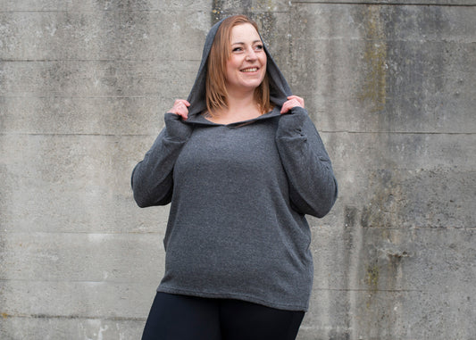 PLUS SIZE, long, plain knitted sweater with a large hood and thumbholes in gray 