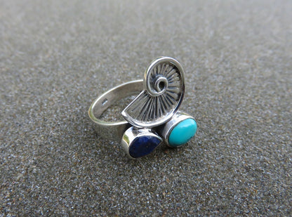 Ring with snail and stones made of silver 