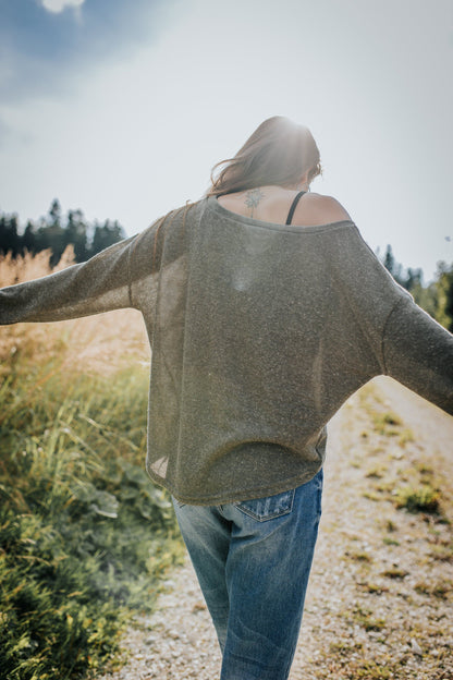 half-length, loose knitted top in kaki green 