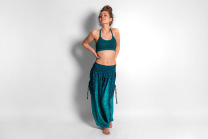 Yoga top with the pattern of the flower of life turquoise/black 