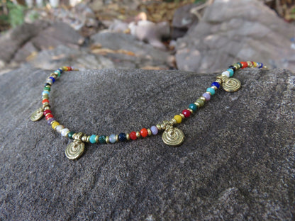 colorful anklet with small spirals made of brass 