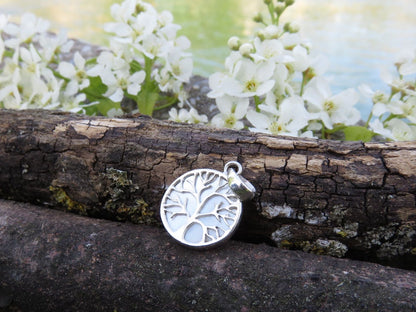 Mother of pearl pendant with the motif of the tree of life made of silver