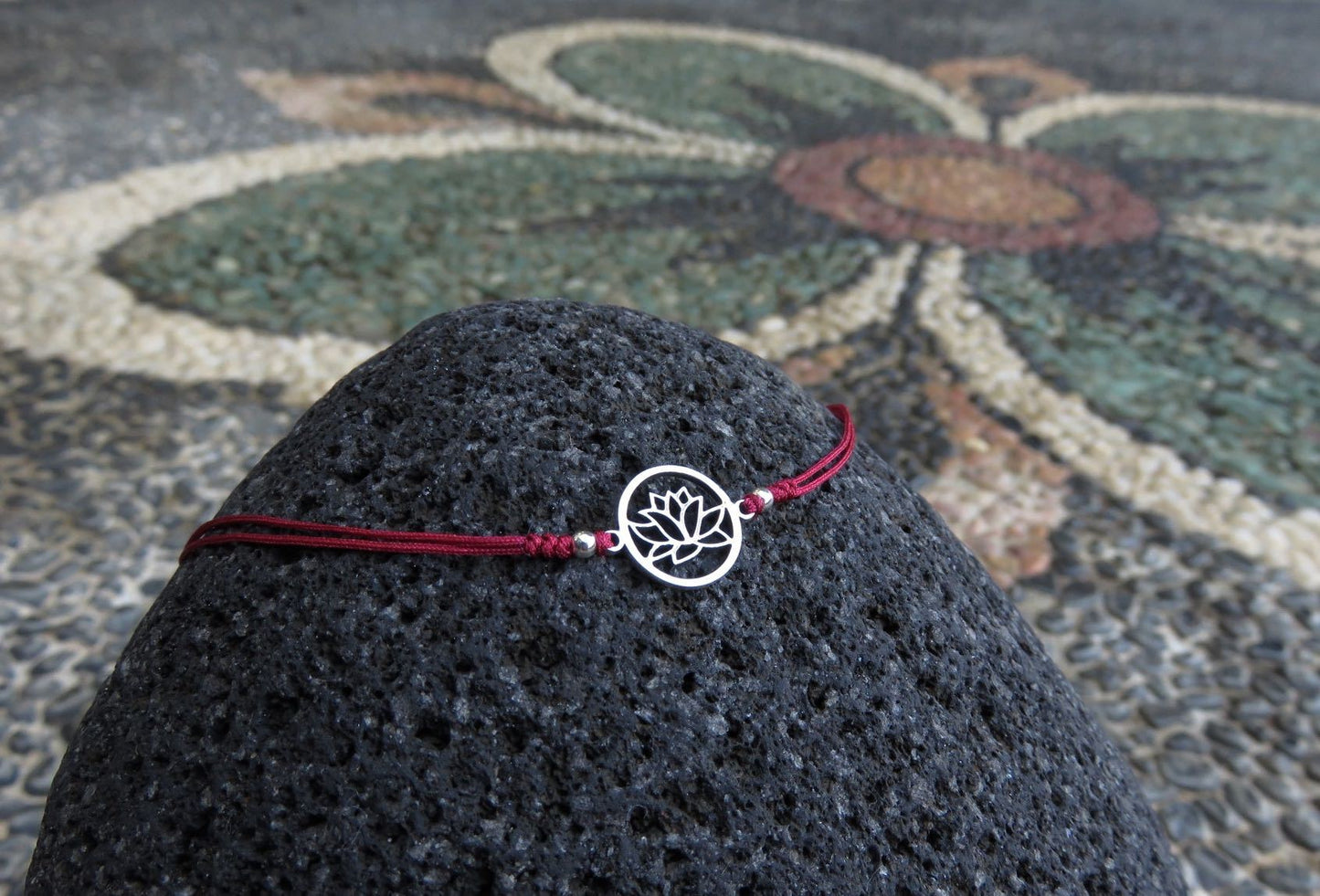 Lotus flower bracelet made of silver in dark red 