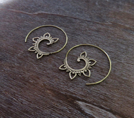 small spiral earrings with flower pattern made of brass