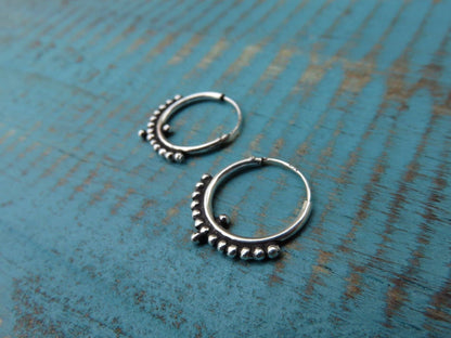 simple hoop earrings with silver dots 