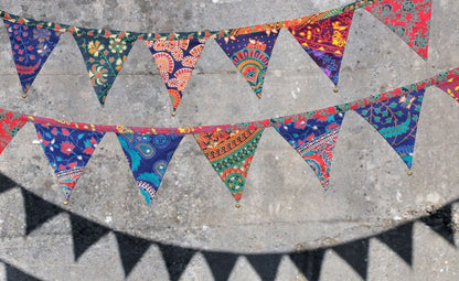 Bunting made of colorful flags with bells