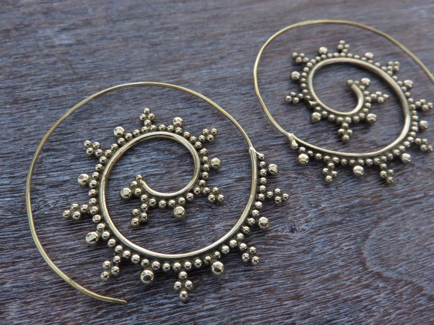large spiral earrings with brass dots 