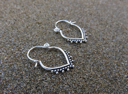 small hoop earrings with silver dots 