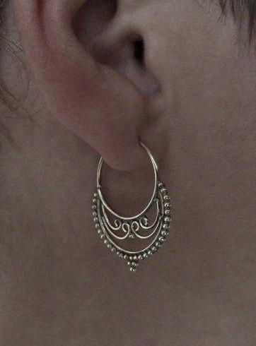 small hoop earrings with spirals and dots made of brass 