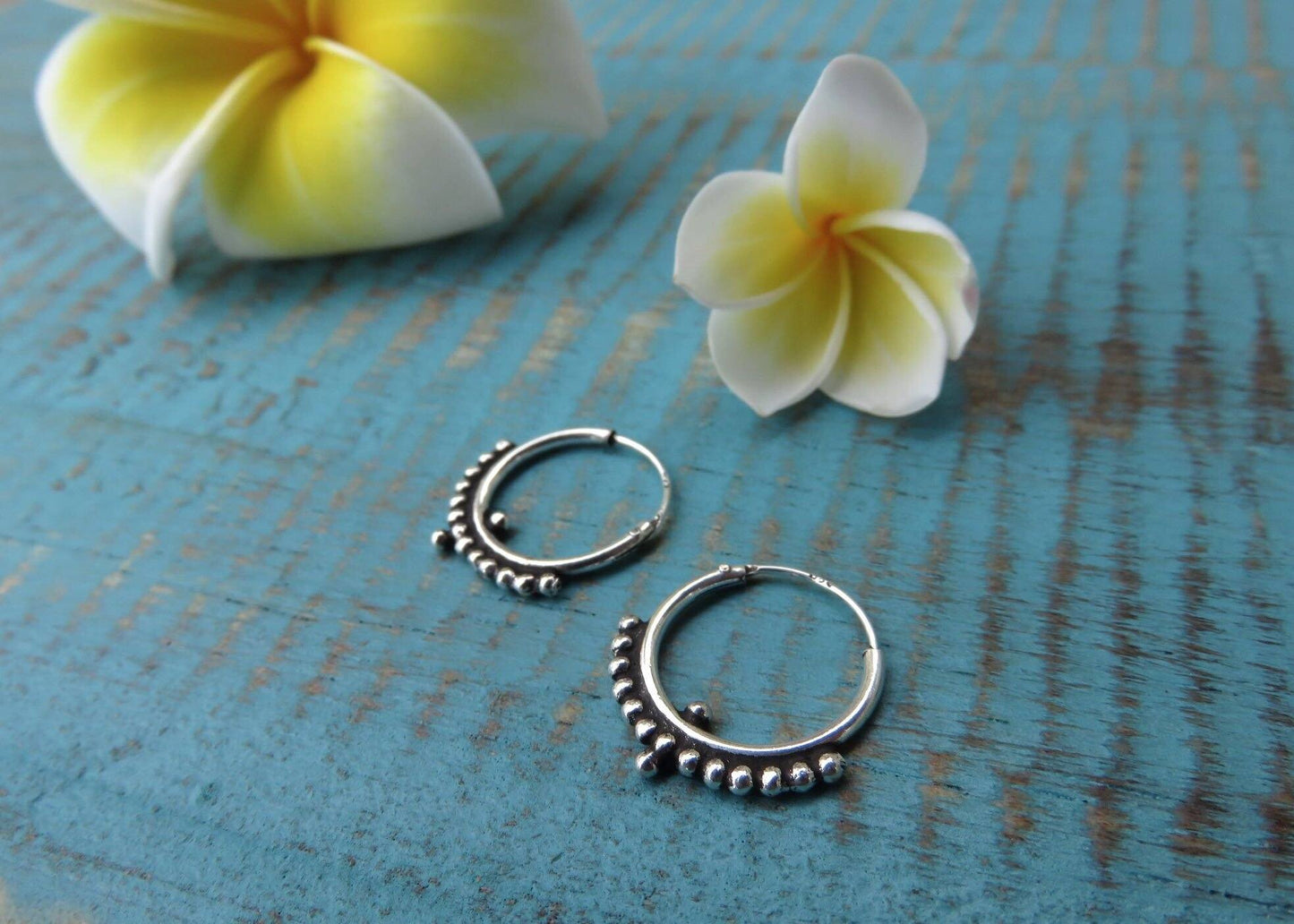 simple hoop earrings with silver dots 