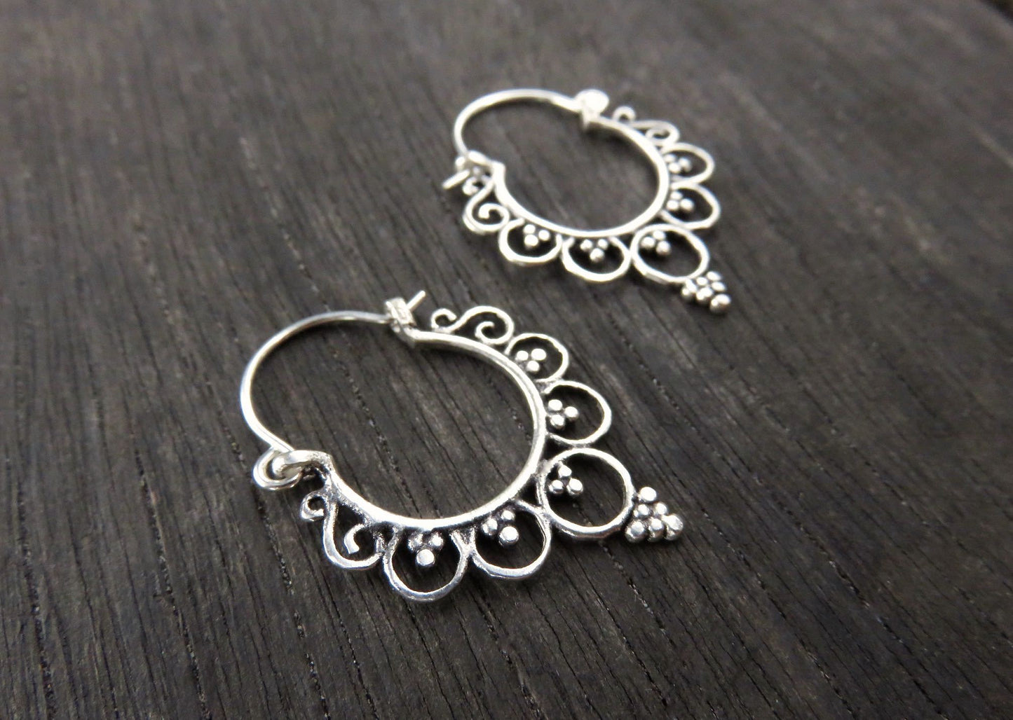 small hoop earrings with circles and dots made of silver 