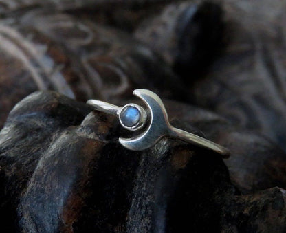 Ring with small stone and moon made of silver 