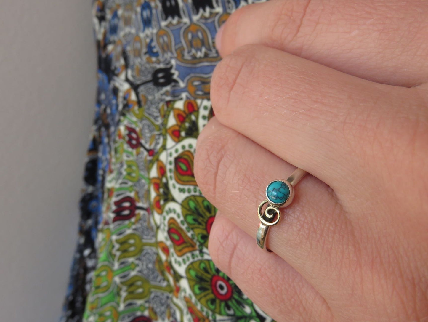 Silver ring with spiral made of brass and turquoise stone 
